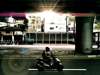 View of illuminated buildings in city