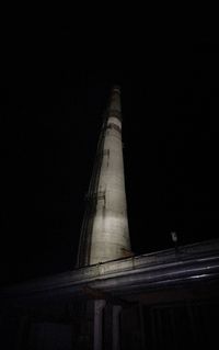 Low angle view of historical building against sky at night