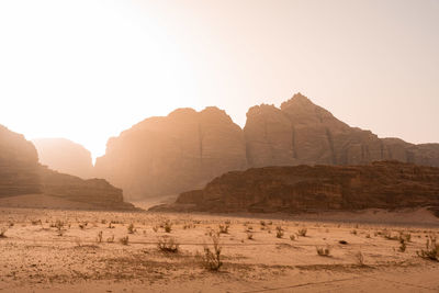 Scenic view of desert against clear sky