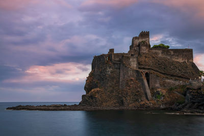 Scenic view of a castle against the sea