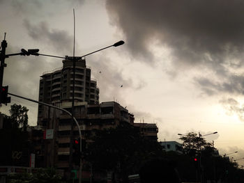 Street and buildings against sky