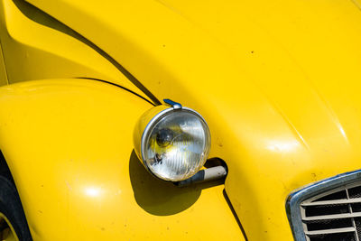 Close-up of yellow car