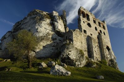 Low angle view of old ruin building against sky