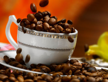 Close-up of coffee beans on table