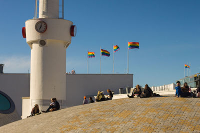 People against clear sky