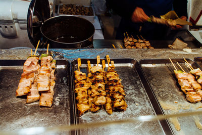 High angle view of yakitori in tray at market stall