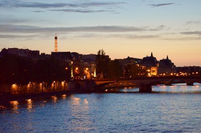 Illuminated buildings at waterfront