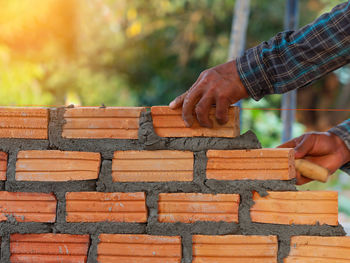 Close-up of man working on wood