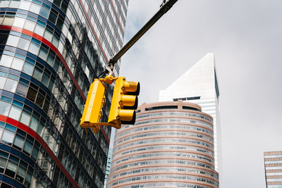 Low angle view of modern buildings against sky