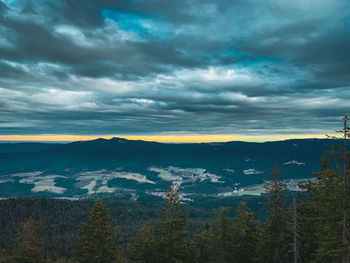 Scenic view of landscape against sky during sunset