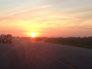 Scenic view of landscape against sky during sunset