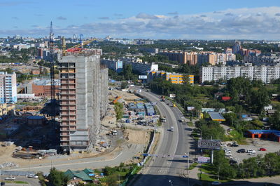 High angle view of street amidst buildings in city