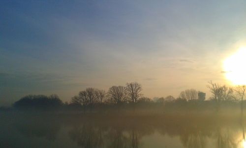 Scenic view of landscape at sunset