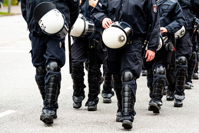 Low section of police force walking on street