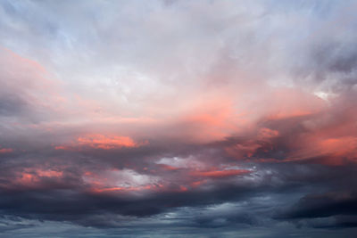 Low angle view of dramatic sky during sunset