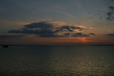 Scenic view of sea at sunset