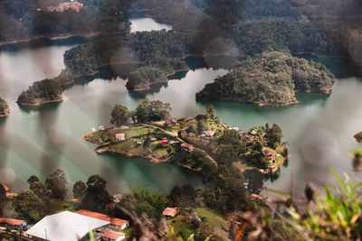 An island in the peñol-guatapé reservoir in colombia seen from the rock of guatape