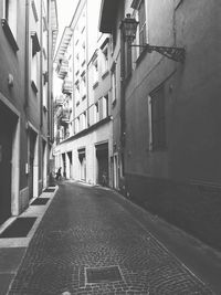 Narrow alley along buildings