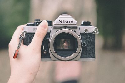 Close-up of person photographing