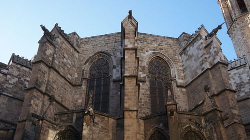 Low angle view of historic building against sky