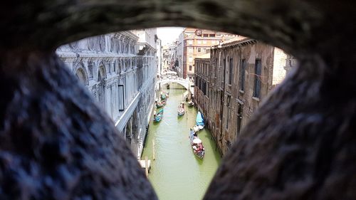 People on bridge over water