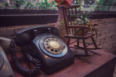 Close-up of old vintage car on table