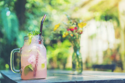 Close-up of glass jar on table