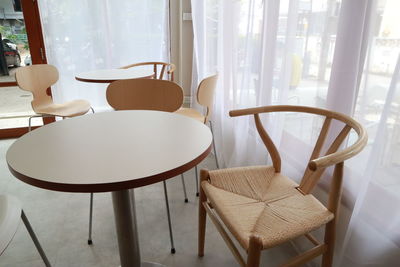 Empty chairs and table at home