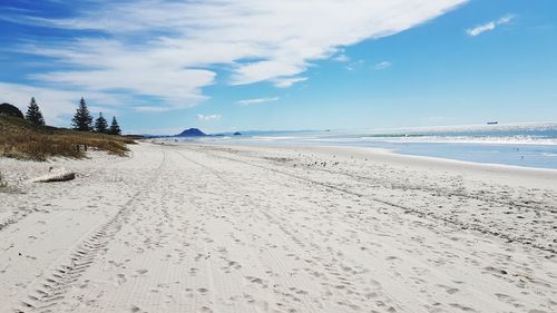 Scenic view of beach against sky