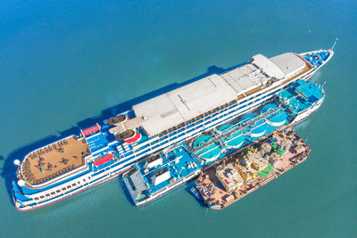 High angle view of sea against blue sky