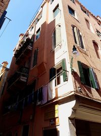 Low angle view of residential building against sky