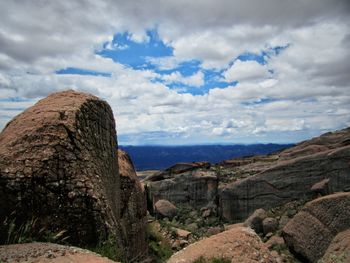 Scenic view of rock formations against sky