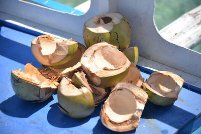 High angle view of coconuts on table