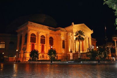 Illuminated building at night