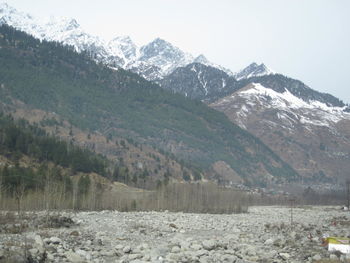 Scenic view of mountains against sky during winter