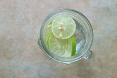 Directly above shot of drink in glass on table