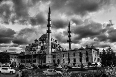 Low angle view of suleymaniye mosque against cloudy sky