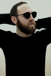 Portrait of young man wearing sunglasses