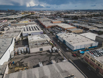 High angle view of street amidst buildings in city