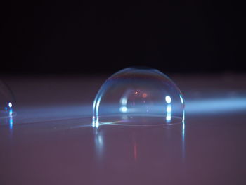 Close-up of bubble on table