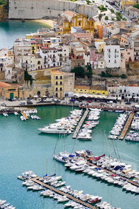 High angle view of boats in city