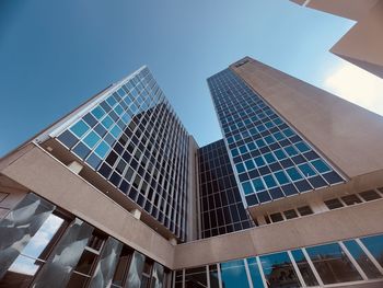 Low angle view of modern buildings against clear sky