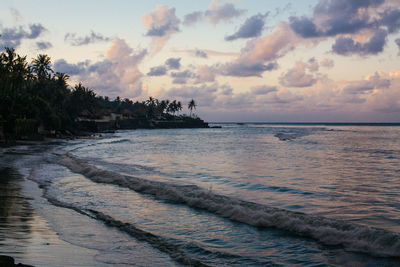 Scenic view of sea against sky at sunset