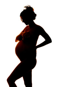 Silhouette woman standing against white background