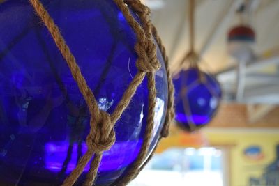 Close-up of blue hanging