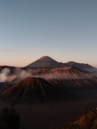 Scenic view of mountains against sky during sunset