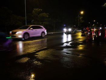 Traffic on street at night