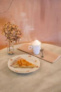 Close-up of coffee cup on table