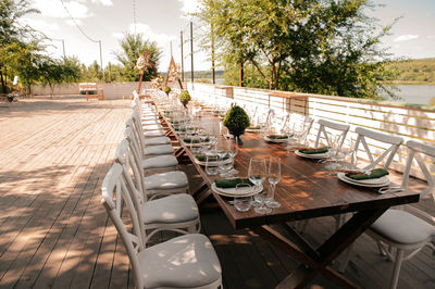 Empty chairs and tables in restaurant