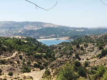 Scenic view of lake with mountains in background